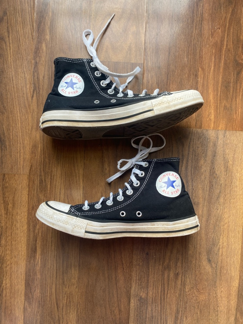 Converse Black and White High Top Chuck Taylor Sneakers